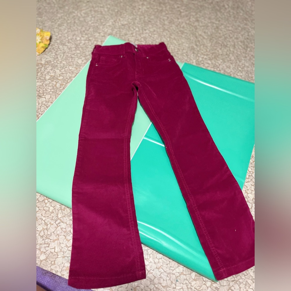 this is a cute maroon cooler boot cut jeans